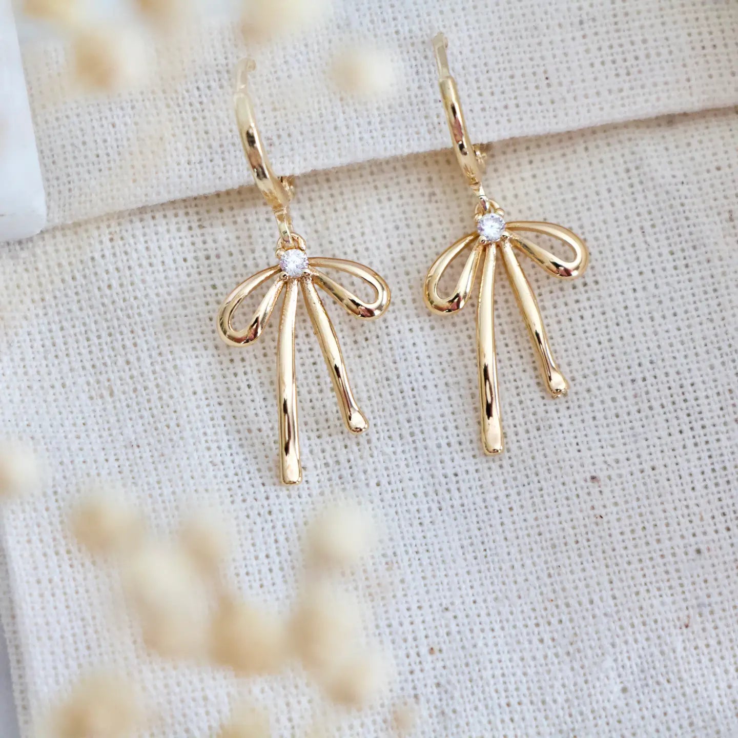 CZ Bow Huggie Earrings